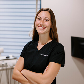 Dr. Amanda Schwaderer smiling at the dental office