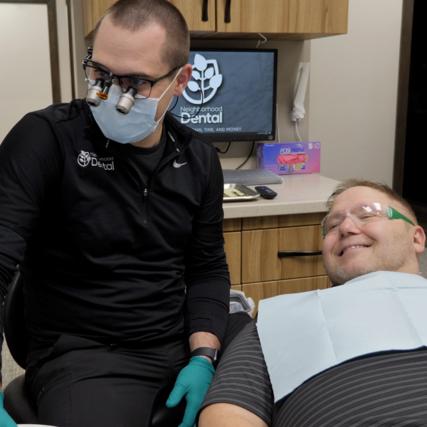 Photo of a patient receiving treartment at Neighborhood Dental